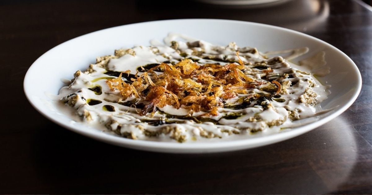 Kashk-e Bademjan Persian eggplant dip with garlic, onion, and kashk, creamy texture and rich savory flavor