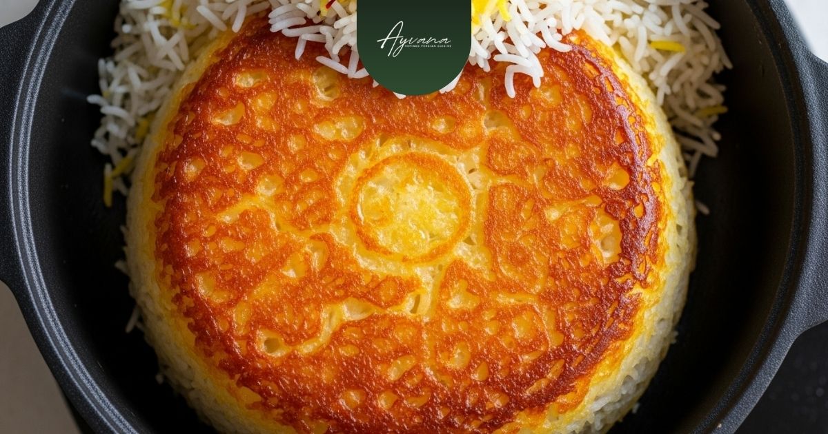 Golden crispy Persian tahdig, the prized bottom crust of saffron rice, beautifully formed in a black cooking pot at Ayvana.